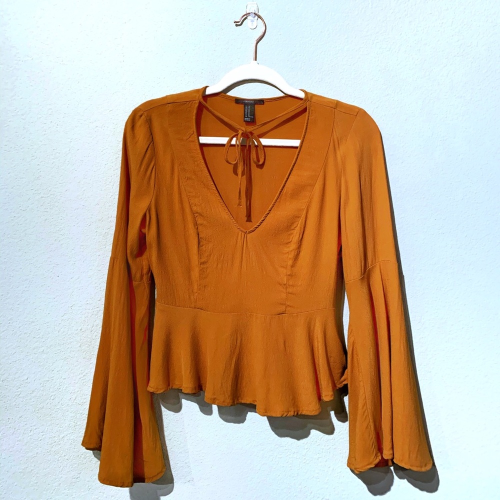 FOREVER 21 size M. Flowey, boho, peplum top.